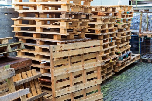 Crew loading sorted items for transfer to local recycling hubs and charities